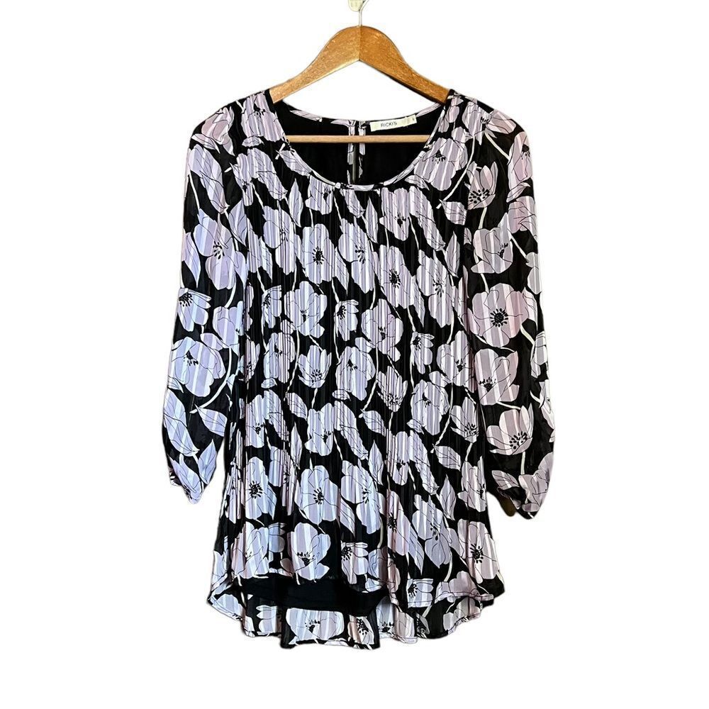 3 for $30! Ricki’s light purple floral tunic. Size 6